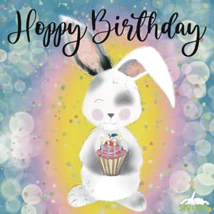 Rabbit holding birthday cake with candles 'Happy Birthday' birthday ecard