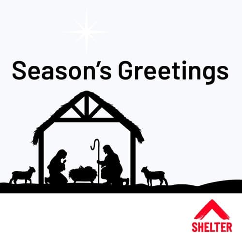 Silhouette of Mary and Joseph kneeling beside baby Jesus 'Season's Greetings' religious Christmas ecard